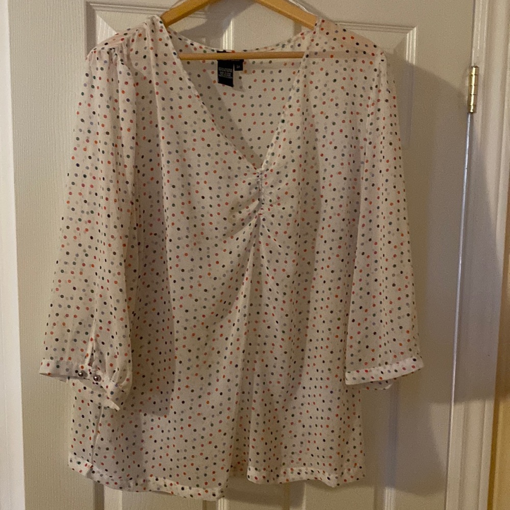 White with pastel polka dot plus size blouse.